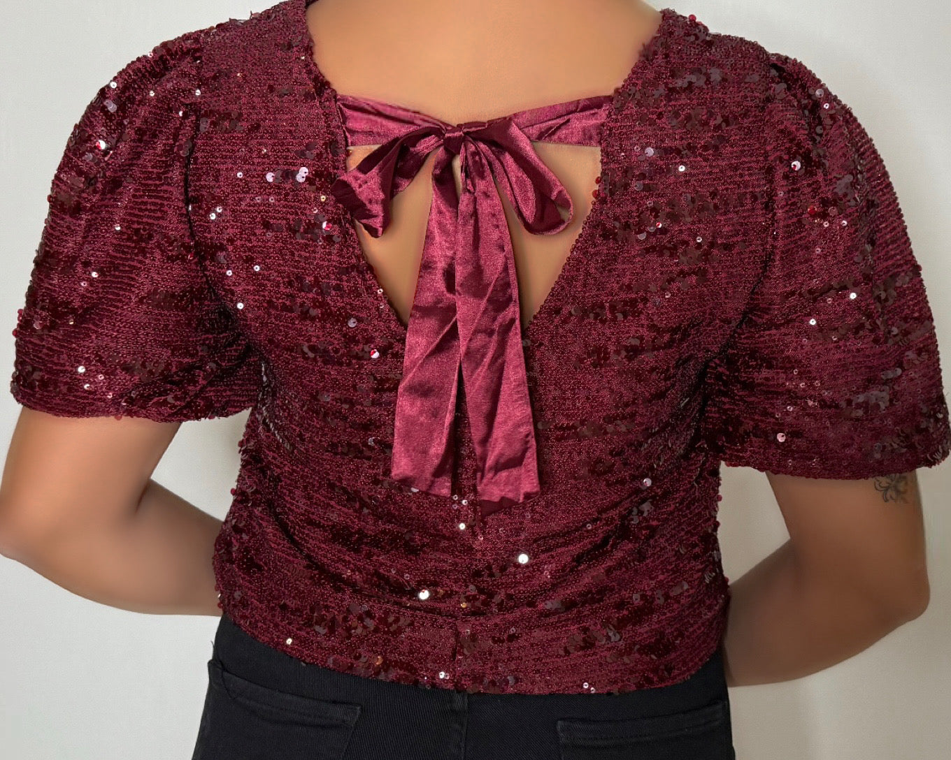 Top bordeaux à paillettes